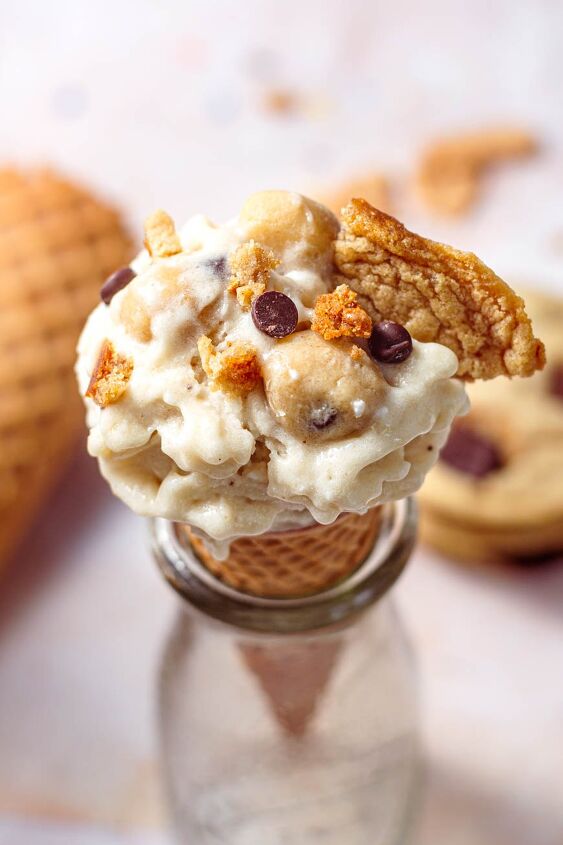 banana nice cream with cookie dough, a scoop of cookie dough banana ice cream in a sugar cone
