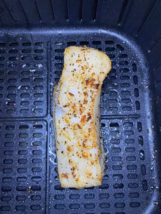 air fryer chilean sea bass recipe happy honey kitchen, In the air fryer basket after cooking