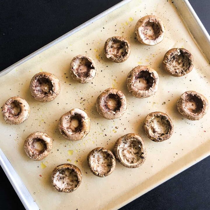 crab stuffed mushrooms with cream cheese, Place on a baking sheet and spray with olive oil