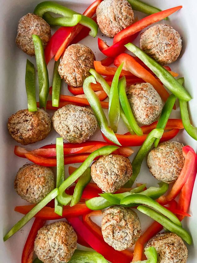 Transfer frozen turkey meatballs and sliced peppers to a crockpot