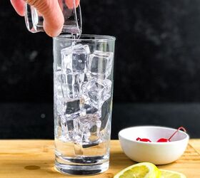 Add vodka to a highball glass filled with ice