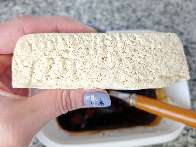 Spongy structure of tofu that was frozen makes it ideal for marinating
