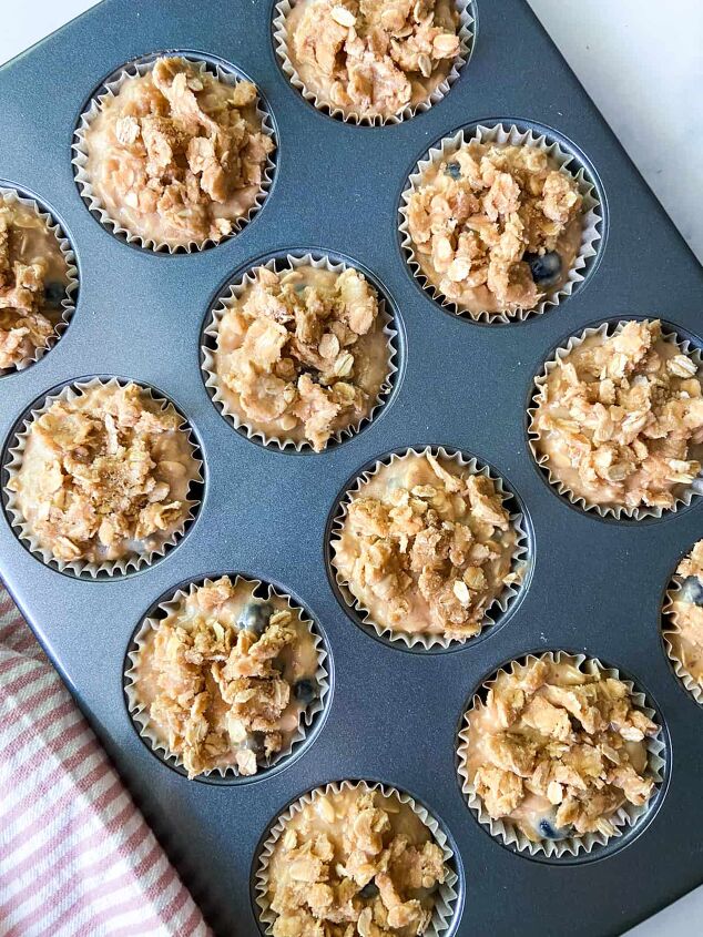 banana blueberry oatmeal muffins, Divide the batter and top with oat streusel