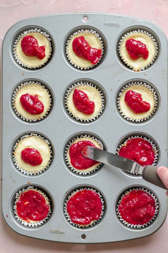 mini strawberry cheesecake cups, Spread strawberry sauce onto the baked and cooled cheesecakes