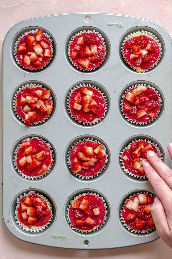 mini strawberry cheesecake cups, Add chopped strawberries to the strawberry sauce
