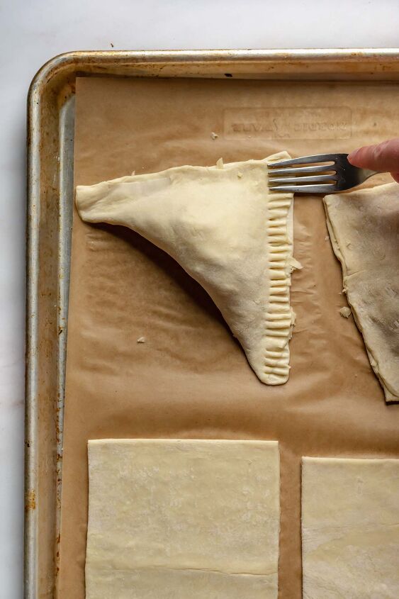 puff pastry ham and cheese turnovers, Use a fork to crimp the edges to finish sealing