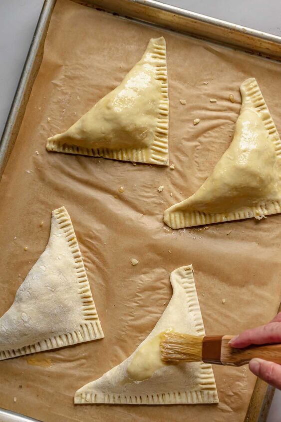 puff pastry ham and cheese turnovers, Brush egg wash onto each turnover