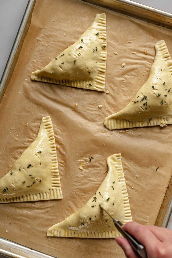 puff pastry ham and cheese turnovers, Cut small slits into the pastry to release steam