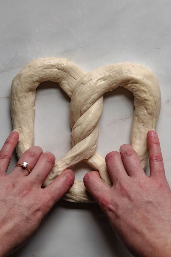 crab pretzel, Hook fingers around the bottom of the dough to transfer