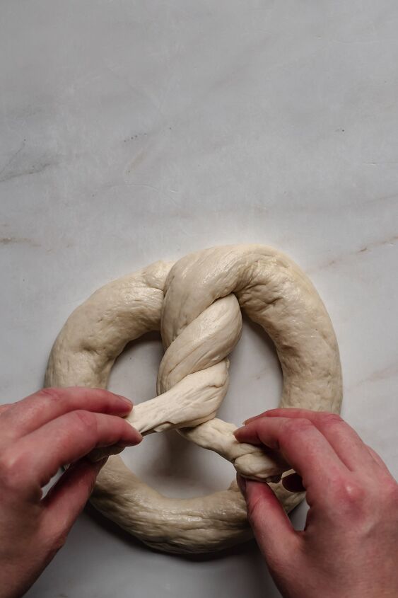 crab pretzel, Bring the dough down and twist it twice then press down the edges