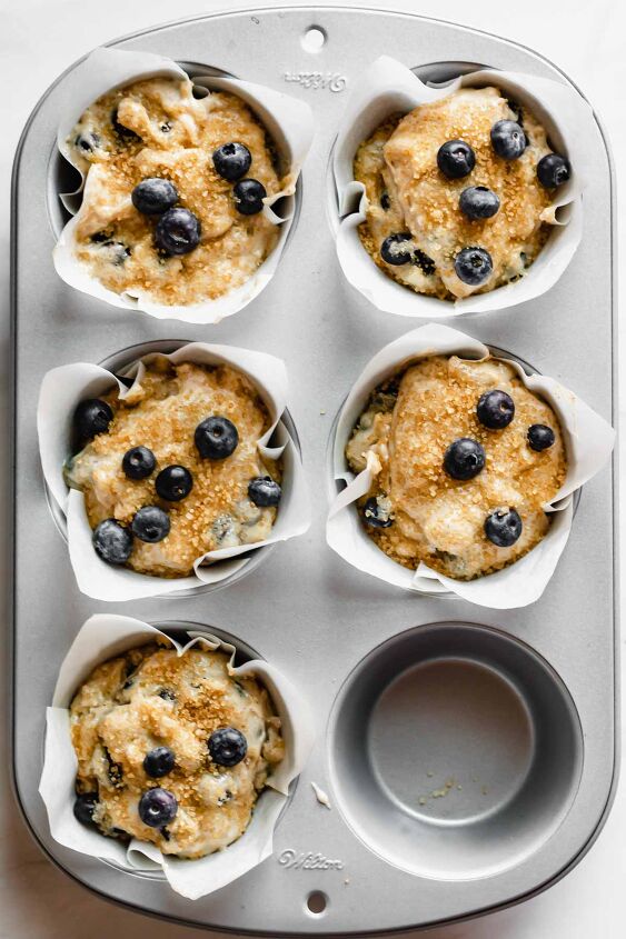 easy jumbo blueberry muffins bakery style, Top the batter with coarse sugar and extra blueberries