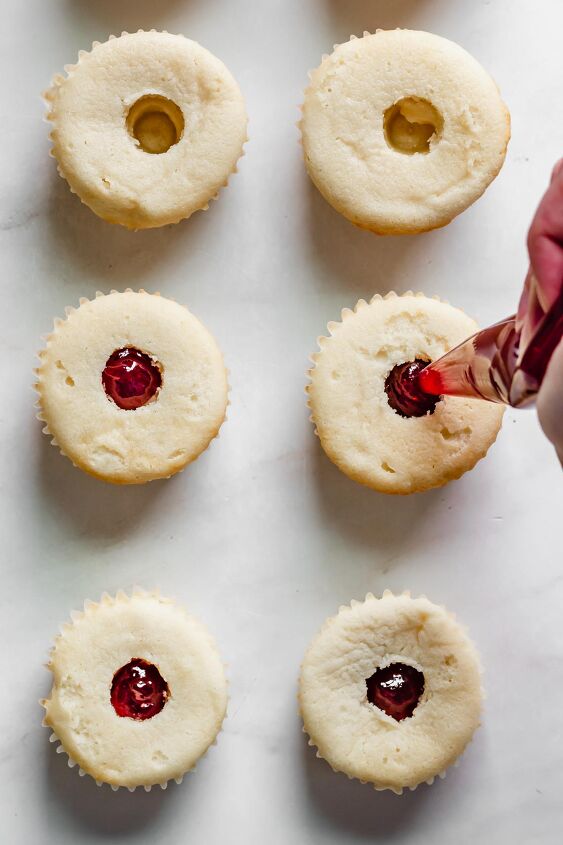 strawberry crunch cupcakes with strawberry filling, Fill each hole with strawberry jam