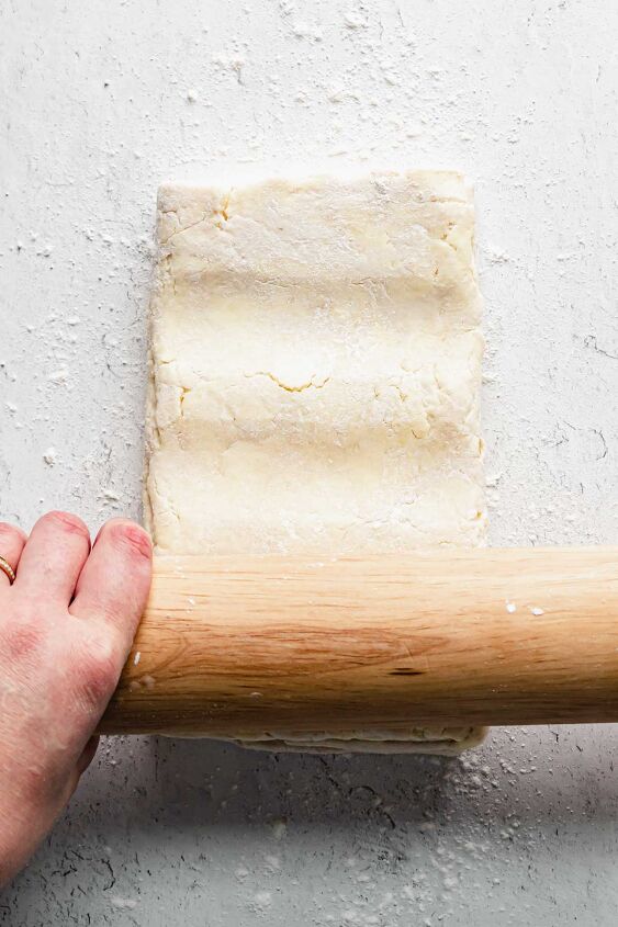perfect rough puff pastry with video, Push the rolling pin into the dough a few times to start the roll