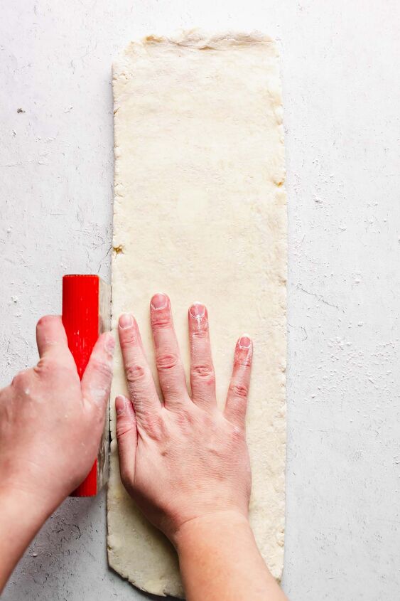 perfect rough puff pastry with video, Roll out the dough and use a bench scraper to edge the sides