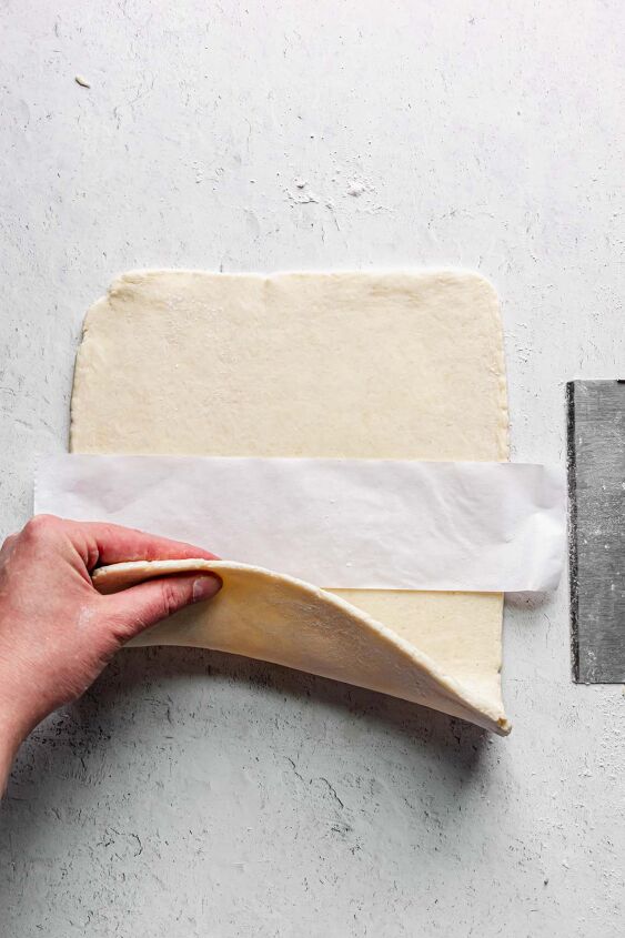perfect rough puff pastry with video, Add a strip of parchment to the center