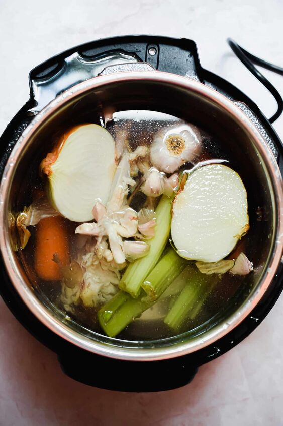 simple instant pot chicken broth, Cover the ingredients with water