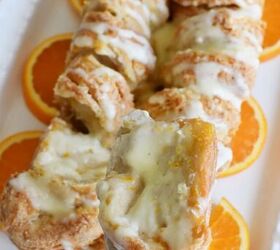 https://cdn-fastly.foodtalkdaily.com/media/2022/08/26/06217/easy-orange-breakfast-pull-apart-loaf-with-cream-cheese-orange-glaze.jpg?size=720x845&nocrop=1