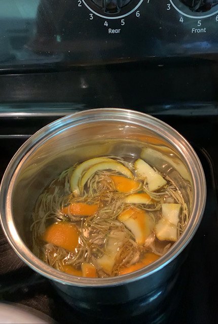 how to make honeysuckle simple syrup, Honeysuckle Syrup Simmering