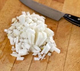 heathy instant pot chicken tortilla soup recipe, chopped onions on wood cutting board with knife best recipe for chicken soup homemade