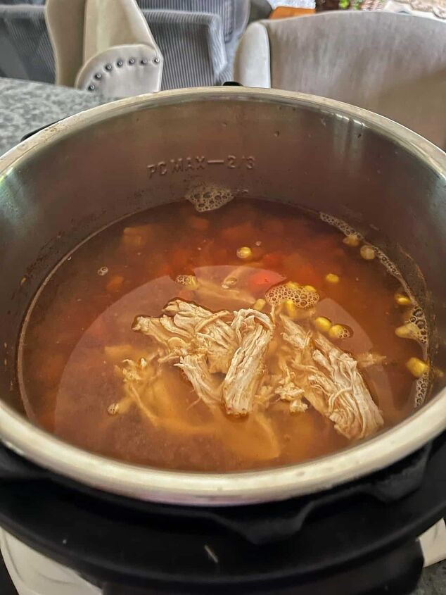 heathy instant pot chicken tortilla soup recipe, After shredding the chicken add it back to the instant pot chicken tortilla soup recipe