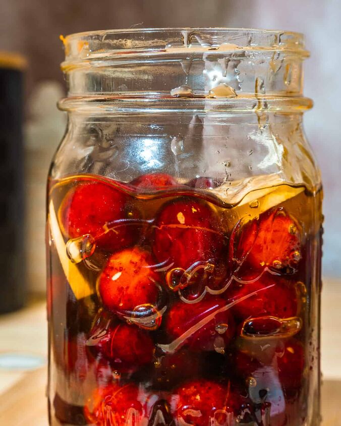 honey fermented cranberries, mason jar filled with honey fermented cranberries