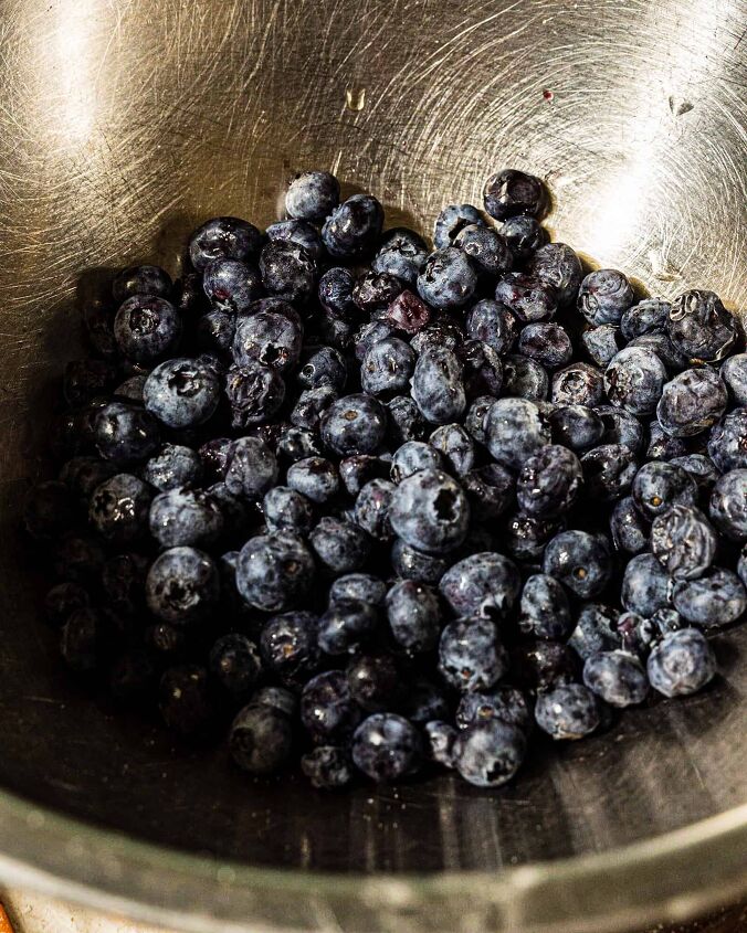 easy blueberry galette, fresh blueberries in a metal bowl