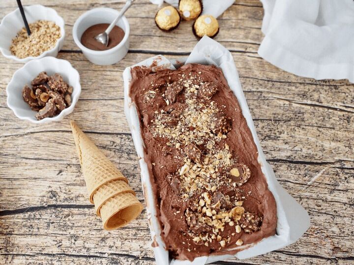 Image of Ferrero Rocher Ice Cream in loaf pan with toppings nearby
