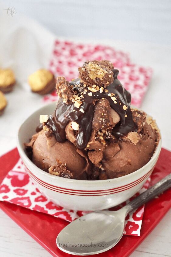 Ferrero Rocher Ice Cream in small dish with Valentine s Napkin topped with hot fudge and crushed Ferrero Rocher chocolates