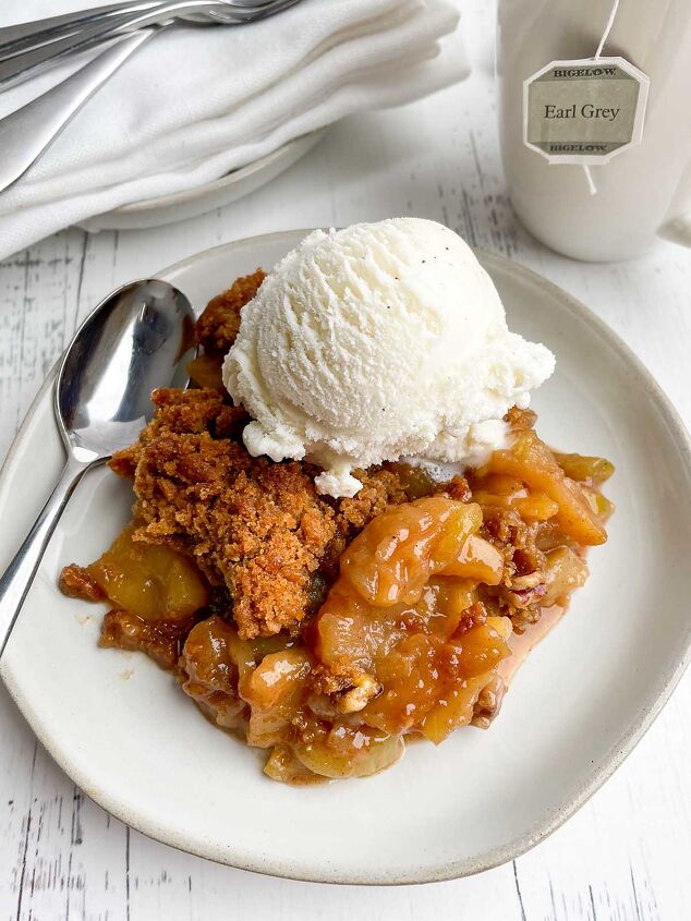apple crisp without oatmeal, serving of apple crisp without oatmeal with ice cream on a white plate