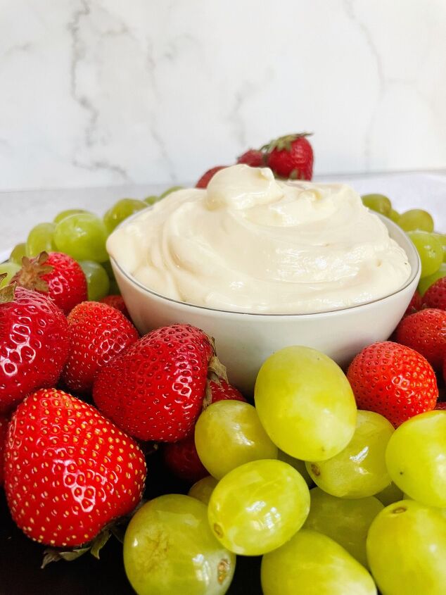 cream cheese fruit dip 4 ingredients, cream cheese fruit dip next to strawberries and grapes