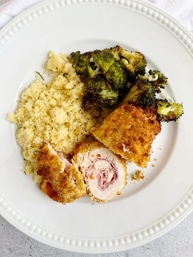 air fryer chicken cordon bleu, air fryer chicken cordon bleu on a plate with couscous and broccoli