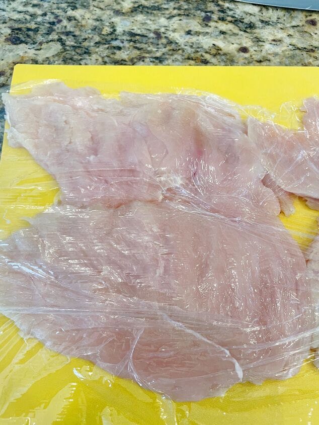 air fryer chicken cordon bleu, Then cover with plastic wrap and pound out to 1 4 inch thickness using a meat mallet meat tenderizer or even a rolling pin