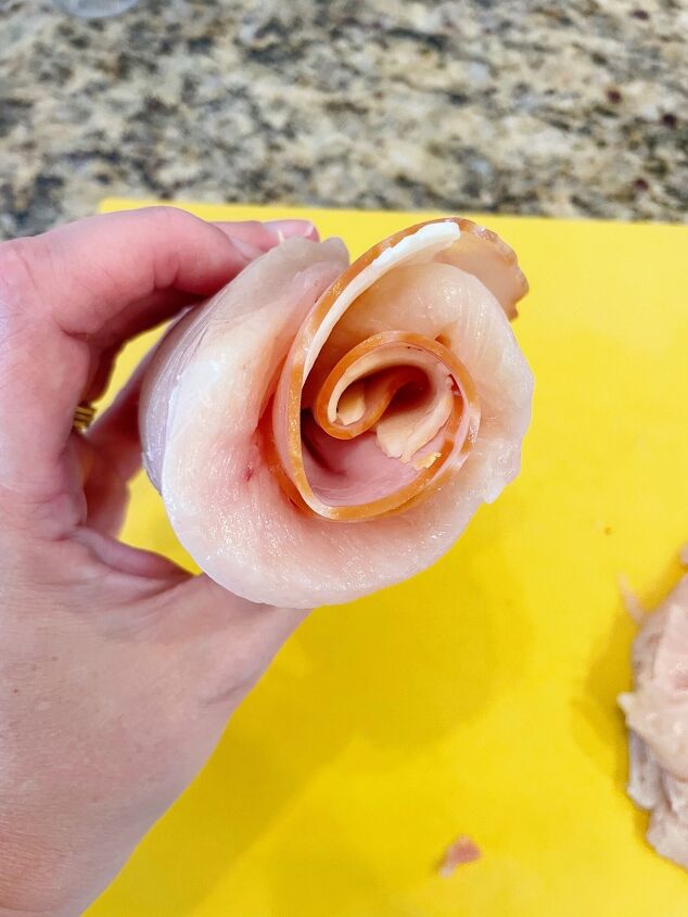 air fryer chicken cordon bleu, Roll up chicken and secure with 2 3 toothpicks to keep from unrolling
