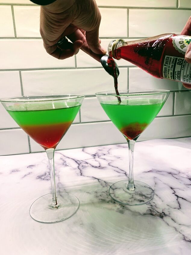 two fun halloween cocktails, Pouring the grenadine into the Monstertini Halloween Cocktail to make it red and green We made this for Halloween but it wouls also make a great red and green Christmas cocktail