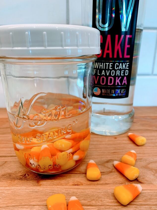 two fun halloween cocktails, Let the candy corns soak in the vodka for several hours then strain