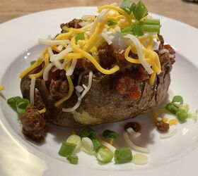 texas skillet chili, Baked Potato Topped with Chili Sour Cream and Green Onions