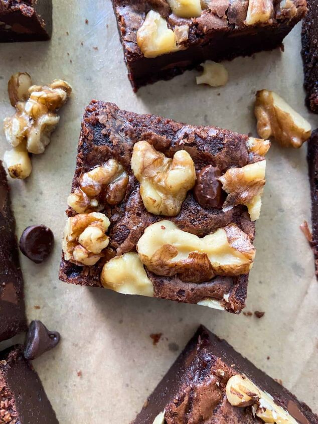 fudgy double chocolate brownies with walnuts, A close up of a walnut covered brownie