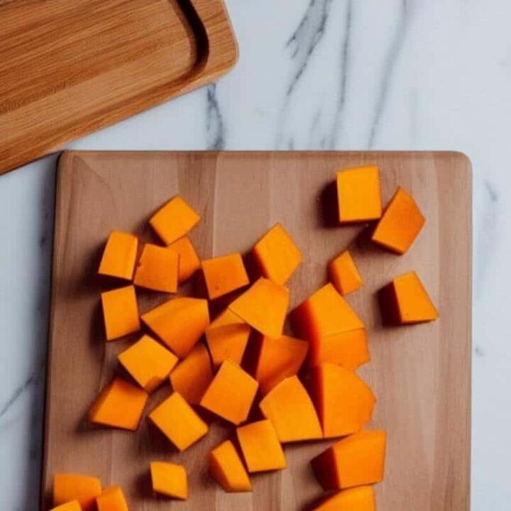 how to cook pumpkin squash, chopping pumpkin on a cutting board