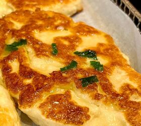 quick easy naan bread recipe with yogurt only 2 ingredients, Buttered Naan Bread with Chives Delish