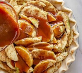 dutch caramel apple pie with crumb topping, Salted caramel pouring over apples in a pie dish