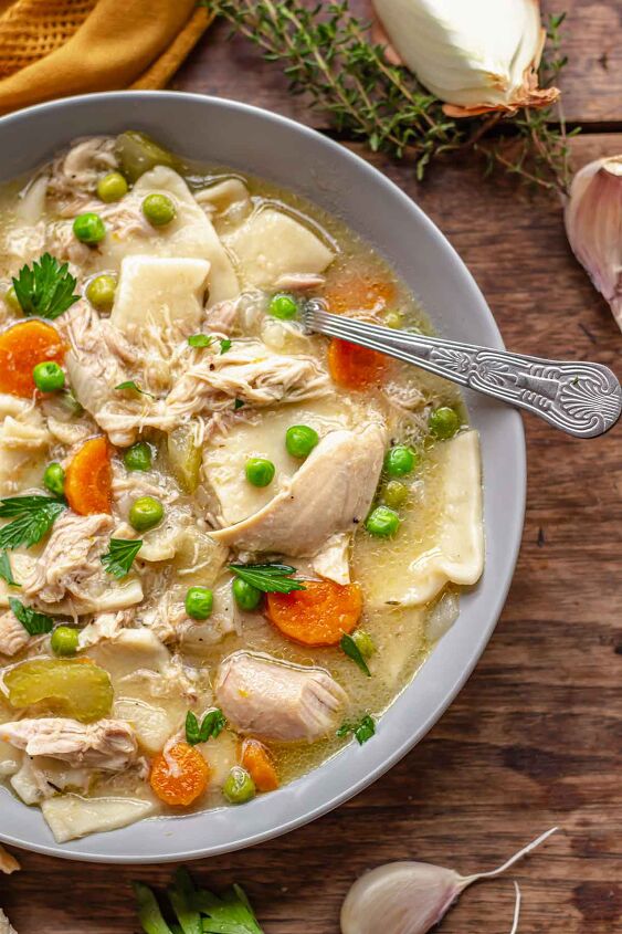 pennsylvania dutch chicken pot pie, Dutch chicken pot pit in a bowl with a spoon in the bowl