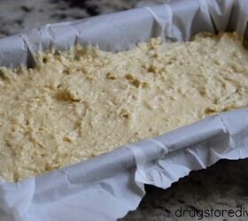 Bread batter in a parchment paper lined loaf pan