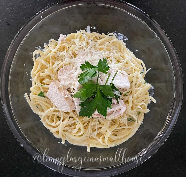 easy homemade alfredo sauce only better, Easy homemade Alfredo Sauce over pasta in a bowl with chicken for serving