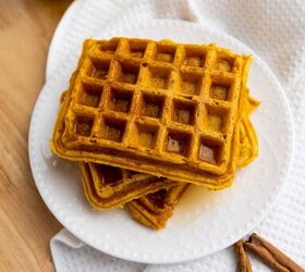 best ever pumpkin spice waffle recipe, pumpkin waffles on a white plate