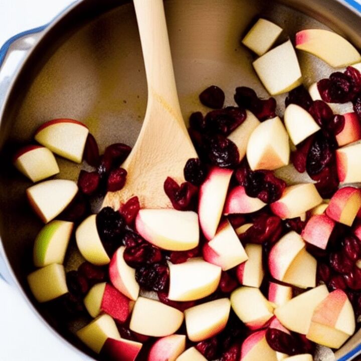 chunky applesauce recipe with cranberries, chopped apples and cranberries in a pot