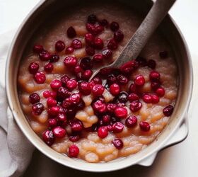 chunky applesauce recipe with cranberries, a pot with applesauce and cranberries in it
