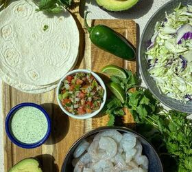 air fryer shrimp tacos with slaw happy honey kitchen, Ingredients needed to make air fryer shrimp tacos are on a cutting board Ingredients include shrimp tortillas cabbage cilantro avocado pico de gallo and creamy jalapeno salsa