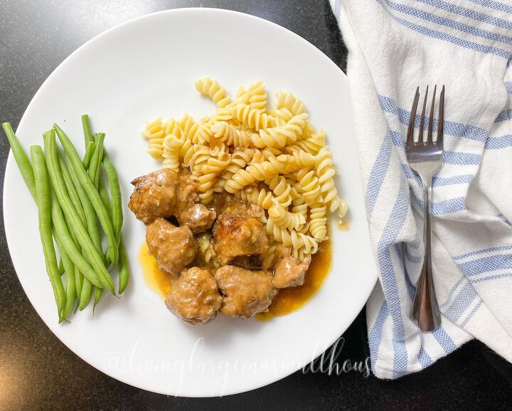 the best ever homemade swedish meatballs recipe, swedish meatballs with noodles and beans plated for dinner