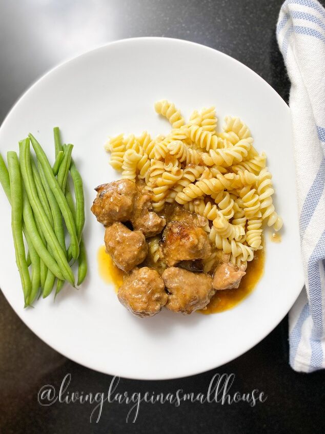 the best ever homemade swedish meatballs recipe, swedish meatballs with noodles and beans plated for dinner