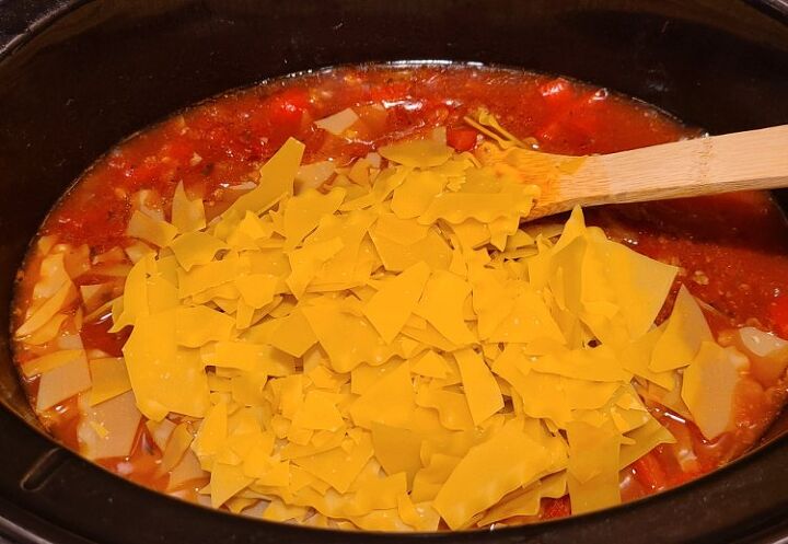 easy crockpot lasagna soup recipe, Chopped Lasagna noodles added to Crockpot Lasagna Soup in crockpot
